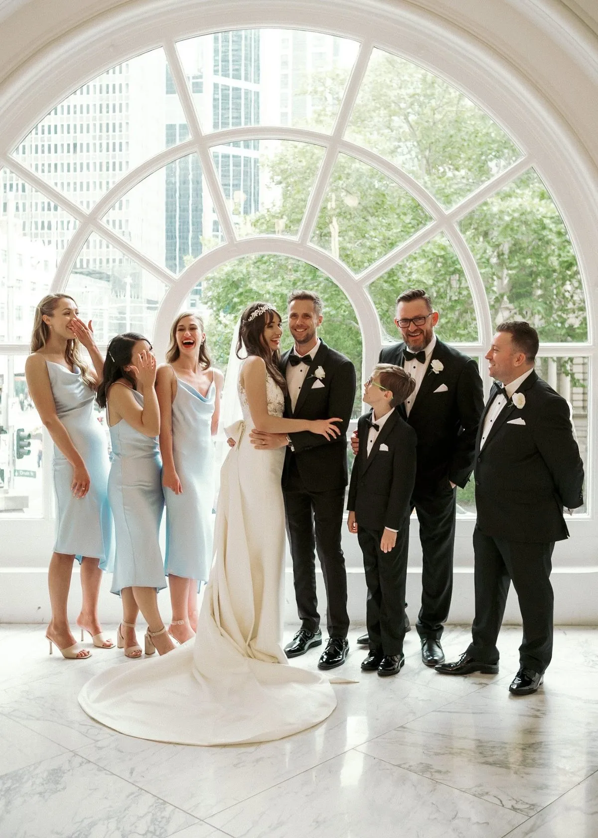 Guest carrying drinks tray at outdoor event