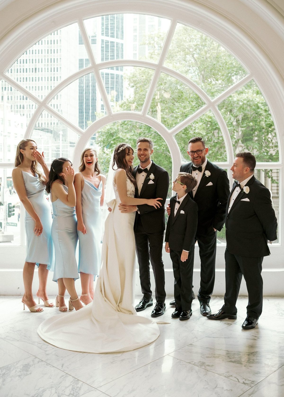 Guest carrying drinks tray at outdoor event