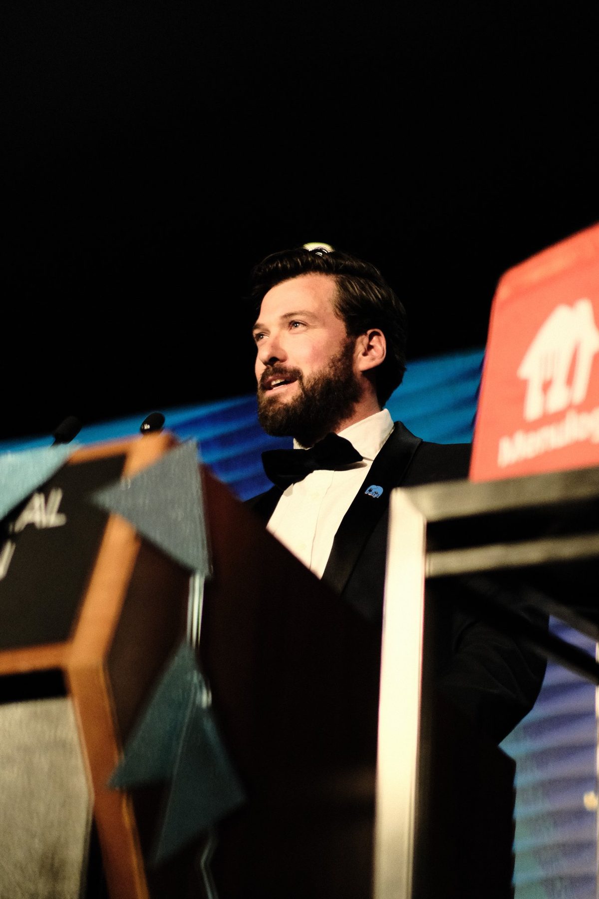 Groom putting on shoes, getting ready